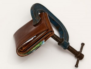 picture of a wallet in a vice